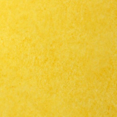 keltainen pinta, jossa on pieniä täpliä