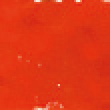 punainen pinta, jossa on valkoisia pisteitä